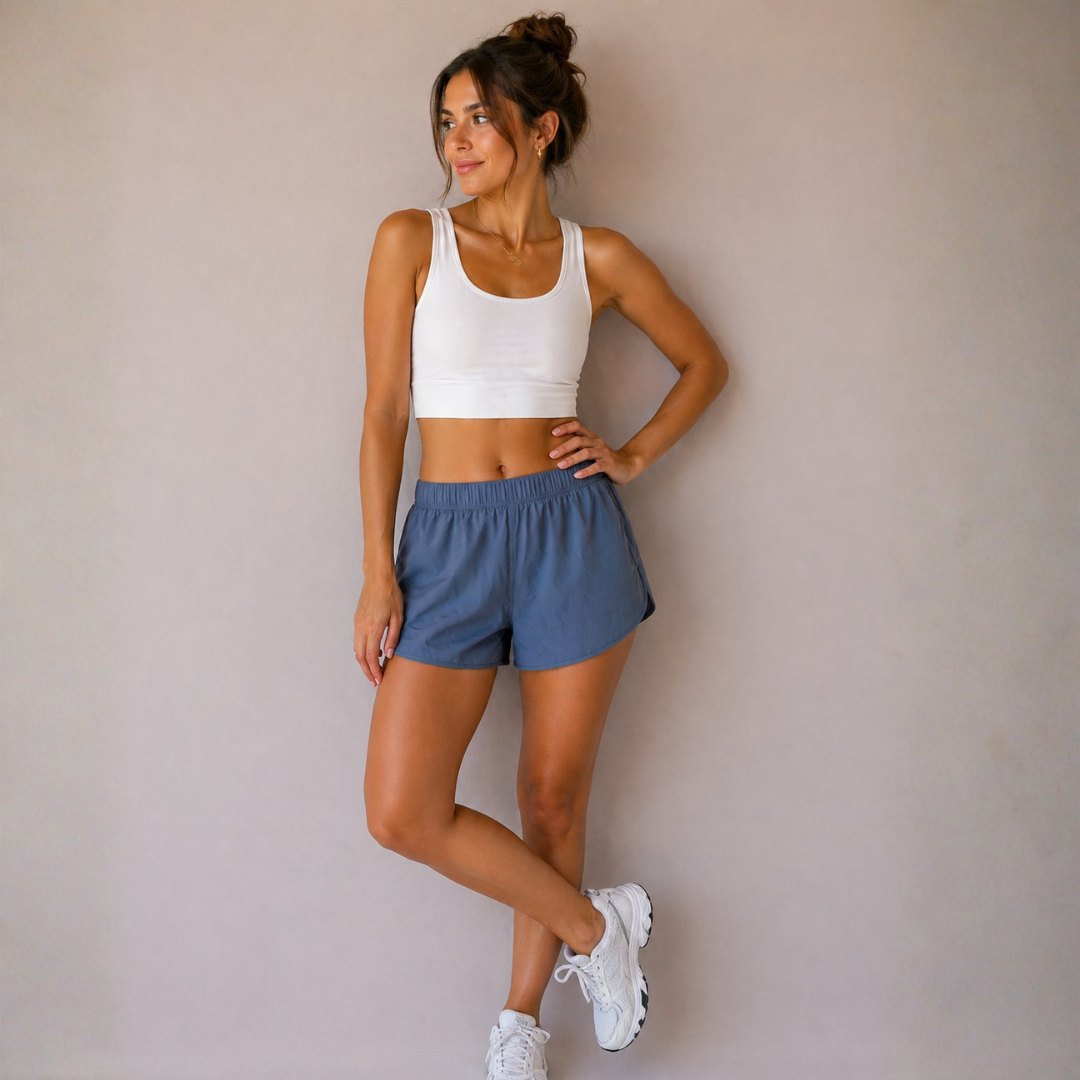 Pantaloneta de mujer celeste oscuro New Balance