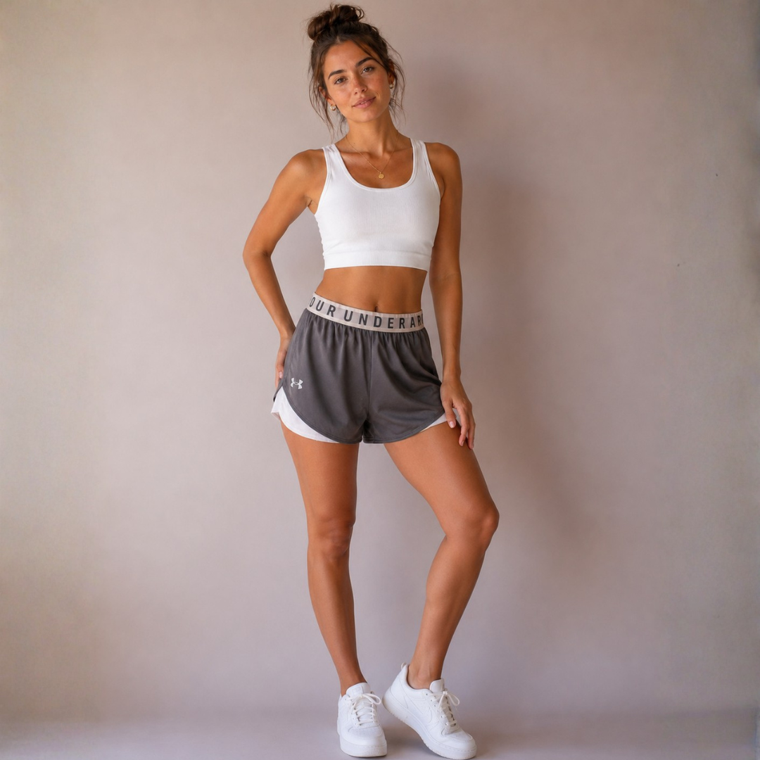 Pantaloneta gris con blanco Under Armour