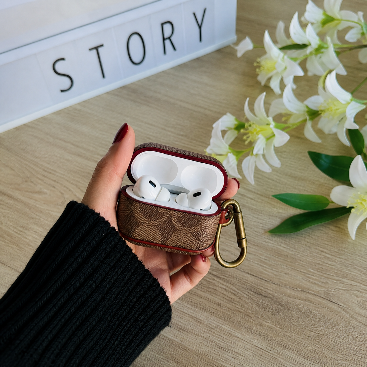 Estuche para audífonos Coach